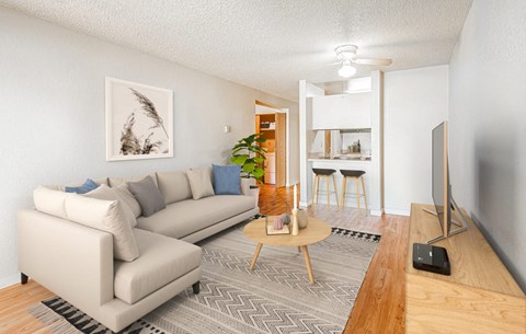 a living room with a couch and a table